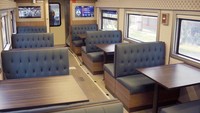 Kereta Makan di rangkaian New Generation ini juga turut diperbarui menjadi lebih mewah dengan interior dan furnitur premium. Kereta Makan tersebut didominasi sentuhan kayu serta kursi makan yang lebih empuk dan lembut. PIDS yang sama juga tersedia di Kereta Makan - Foto: Dok. KAI