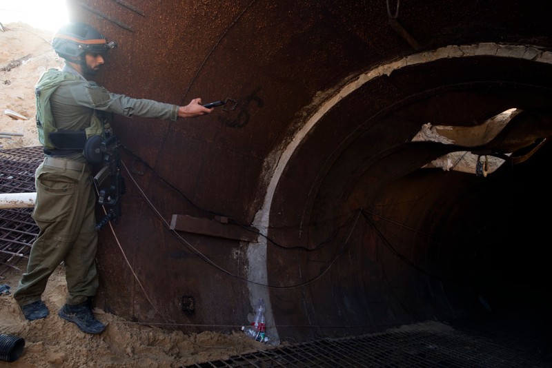 NORTHERN GAZA, GAZA- DECEMBER 15: An Israeli soldier exits a tunnel near the border with Israel on December 15, 2023 in northern Gaza Strip. The Israel Defense Forces say this is the largest tunnel they've found yet in Gaza, comprising branches that extend well over four kilometers (2.5 miles) and reaches 400 meters (1,310 feet) from the Erez crossing. The IDF alleges the project of building the tunnel was led by Mohammed Sinwar, the brother of Hamas leader Yahya Sinwar and was used as part of the Oct. 7 attack, funnelling fighters near the Erez crossing and Israeli border communities. As the IDF have pressed into Gaza as part of their campaign to defeat Hamas, they have highlighted the militant group's extensive tunnel network as emblematic of the way the group embeds itself and its military activity in civilian areas. (Photo by Amir Levy/Getty Images)