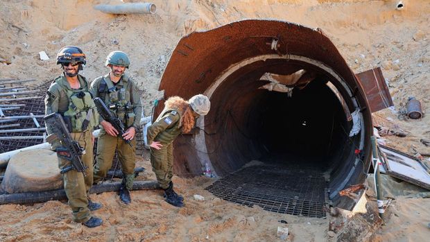 In this picture taken during a media tour organised by the Israeli military on December 15, 2023, soldiers visit a tunnel that Hamas reportedly used to attack Israel through the Erez border crossing on October 7. The Israeli army said on December 17, 2023 it had uncovered the biggest Hamas tunnel in the Gaza Strip so far, just a few hundred metres from the Erez border crossing. (Photo by JACK GUEZ / AFP) (Photo by JACK GUEZ/AFP via Getty Images)
