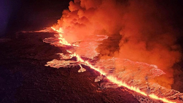 A volcano spews lava and smoke as it erupts near Grindavik, Iceland, December 19, 2023. Civil Protection of Iceland/Handout via REUTERS THIS IMAGE HAS BEEN SUPPLIED BY A THIRD PARTY. NO RESALES. NO ARCHIVES. MANDATORY CREDIT