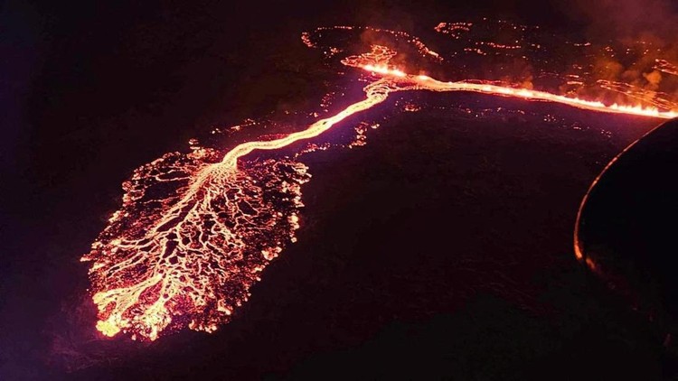 A volcano spews lava and smoke as it erupts near Grindavik, Iceland, December 19, 2023. Civil Protection of Iceland/Handout via REUTERS THIS IMAGE HAS BEEN SUPPLIED BY A THIRD PARTY. NO RESALES. NO ARCHIVES. MANDATORY CREDIT