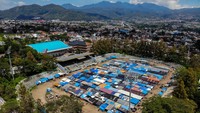 Foto udara kondisi tempat relokasi pasar di Stadion Gelora Brantas, Batu, Jawa Timur, Rabu(20/12/2023).