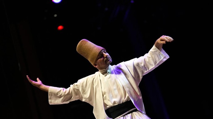 Whirling dervishes of the Mevlevi order perform during a Sheb-i Arus ceremony in Istanbul, Turkey, Sunday, Dec. 17, 2023. Every December a series of events are held to commemorate the death of 13th century Islamic scholar, poet and Sufi mystic Jalaladdin Rumi in different cities of Turkey. (AP Photo/Emrah Gurel)
