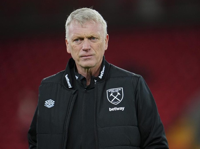 Liverpool's manager Jurgen Klopp, right, and West Ham's manager David Moyes speak before the English Premier League soccer match between Liverpool and West Ham United at Anfield stadium in Liverpool, England, Wednesday, Oct. 19, 2022. (AP Photo/Jon Super)