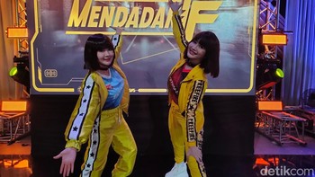 Nah keduanya datang bukan sebagai cosplayer lho. Foto: (Panji Saputro/detikINET).