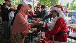 Potret Berbagi Makanan Gratis Rayakan Natal di Gereja Semarang