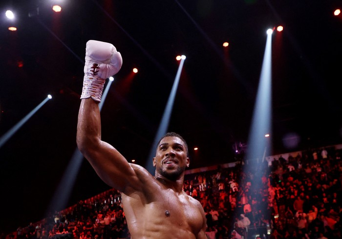 Boxing - Anthony Joshua v Otto Wallin - Kingdom Arena, Riyadh, Saudi Arabia - December 24, 2023 Anthony Joshua celebrates after winning his fight against Otto Wallin REUTERS/Ahmed Yosri
