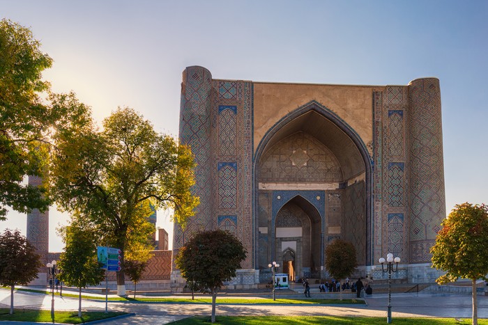 Samarkand, Uzbekistan - October, 2017. Corner of Bibi-Khanym Mosque during amazing sunset