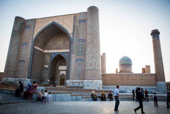 Samarkand, Uzbekistan - October, 2017. Corner of Bibi-Khanym Mosque during amazing sunset