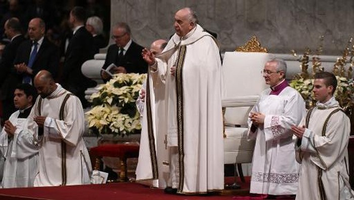 Pope Francis presides the Christmas Eve mass at St. Peters Basilica in the Vatican on December 24, 2023. (Photo by Tiziana FABI / AFP)