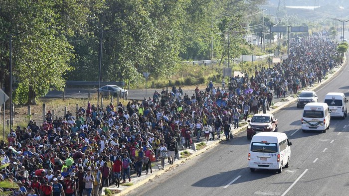 Migrants depart from Tapachula, Mexico, Sunday, Dec. 24, 2023. The caravan started the trek north through Mexico just days before U.S. Secretary of State Antony Blinken arrives in Mexico City to discuss new agreements to control the surge of migrants seeking entry into the United States. (AP Photo/Edgar H. Clemente)