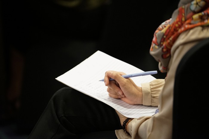 umrah Professional executive customer call center holding hot coffee glass and relax after lunch time in the office