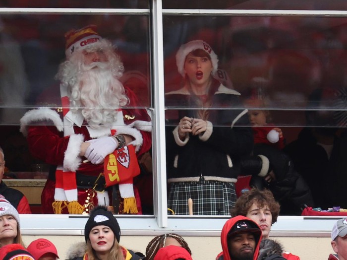 KANSAS CITY, MISSOURI - DECEMBER 25: Taylor Swift looks on during a game between the Las Vegas Raiders and the Kansas City Chiefs at GEHA Field at Arrowhead Stadium on December 25, 2023 in Kansas City, Missouri. (Photo by Jamie Squire/Getty Images)