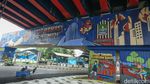 Mural Kota Bekasi Masa Kini Hiasi Kolong Tol Becakayu