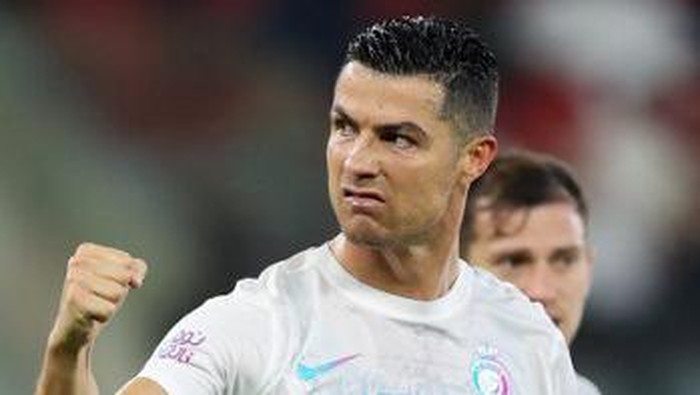 Nassrs Portuguese forward #07 Cristiano Ronaldo reacts during the Saudi Pro League football match between Al-Ittihad and Al-Nassr at King Abdullah Sports City Stadium in Jeddah on December 26, 2023. (Photo by AFP)