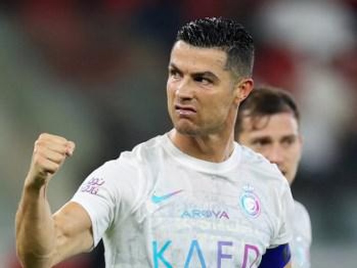 Nassrs Portuguese forward #07 Cristiano Ronaldo reacts during the Saudi Pro League football match between Al-Ittihad and Al-Nassr at King Abdullah Sports City Stadium in Jeddah on December 26, 2023. (Photo by AFP)