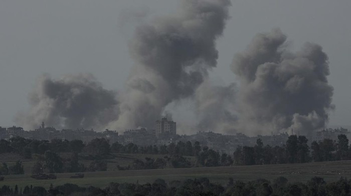Smoke rises following an Israeli bombardment in the Gaza Strip, as seen from southern Israel, Tuesday, Dec. 26, 2023. The army is battling Palestinian militants across Gaza in the war ignited by Hamas Oct. 7 attack into Israel. (AP Photo/Leo Correa)