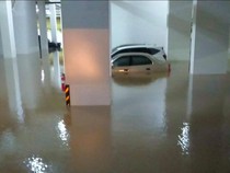 Viral Mobil Terendam Banjir di Basement Apartemen, Bagaimana Cara Klaim Asuransinya?