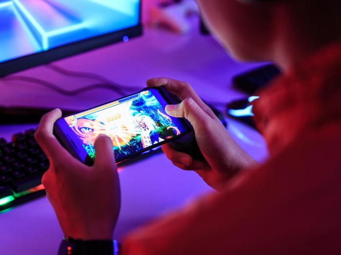 Ilustrasi main game mobile.
