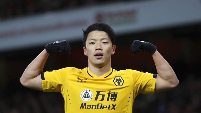 Wolverhampton Wanderers Hwang Hee-chan celebrates after scoring his sides opening goal during the English Premier League soccer match between Wolverhampton and Liverpool at the Molineux stadium in Wolverhampton, England, Saturday, Sept. 16, 2023. (AP Photo/Rui Vieira)