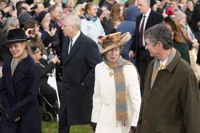 Princess Anne with her husband Timothy Laurence, right, and Prince Andrew arrive to attend the Christmas day service at St Mary Magdalene Church in Sandringham in Norfolk, England, Monday, Dec. 25, 2023.(AP Photo/Kin Cheung)