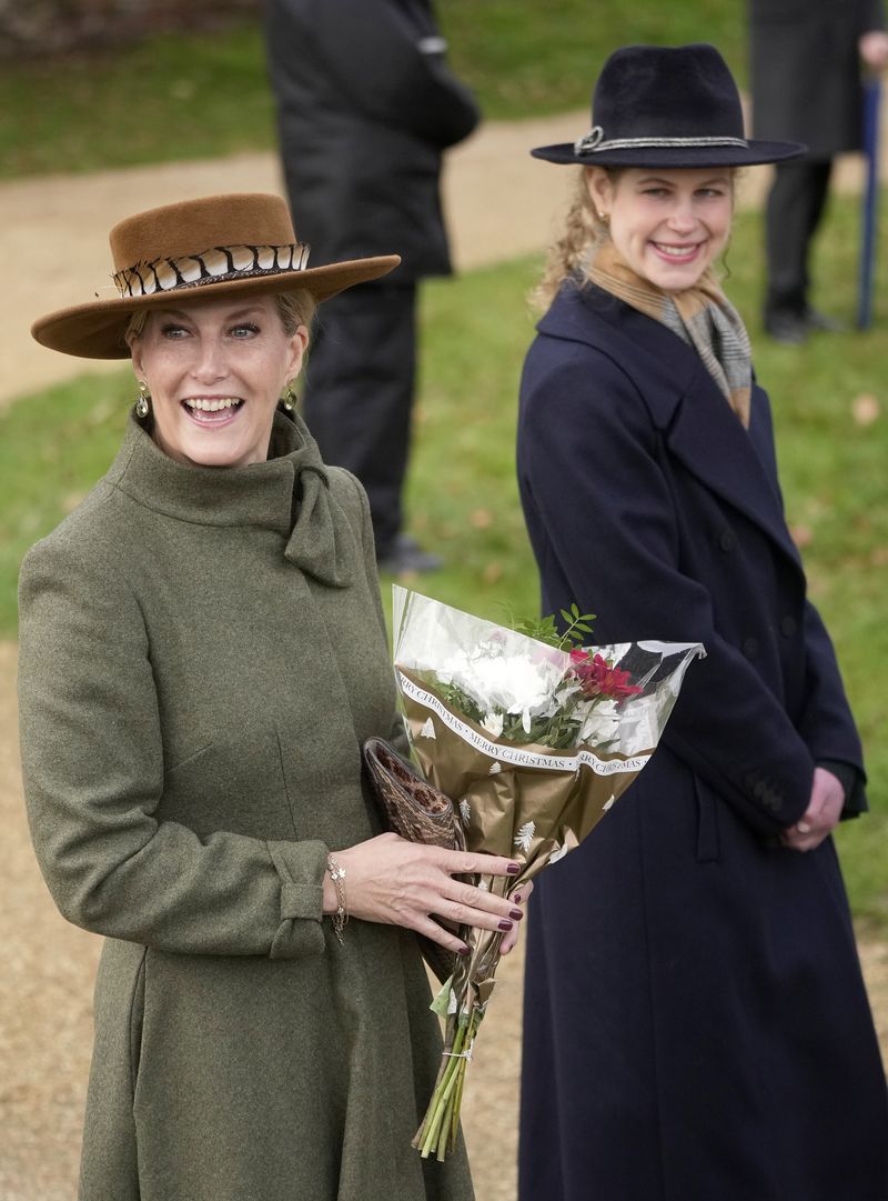 Princess Anne with her husband Timothy Laurence, right, and Prince Andrew arrive to attend the Christmas day service at St Mary Magdalene Church in Sandringham in Norfolk, England, Monday, Dec. 25, 2023.(AP Photo/Kin Cheung)