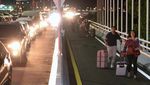 Turis Jalan Kaki-Naik Ojol Gegara Akses ke Bandara Ngurah Rai Macet Parah