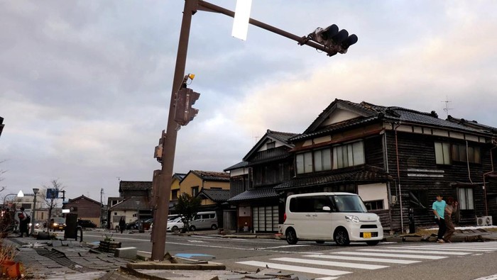 A pavement is broken due to the earthquake in Wajima City, Ishikawa Prefecture on Jan. 1, 2024. A massive magnitude-7.4 earthquake struck Noto district in Ishikawa Prefecture, in central Japan on the same day. ( The Yomiuri Shimbun  )