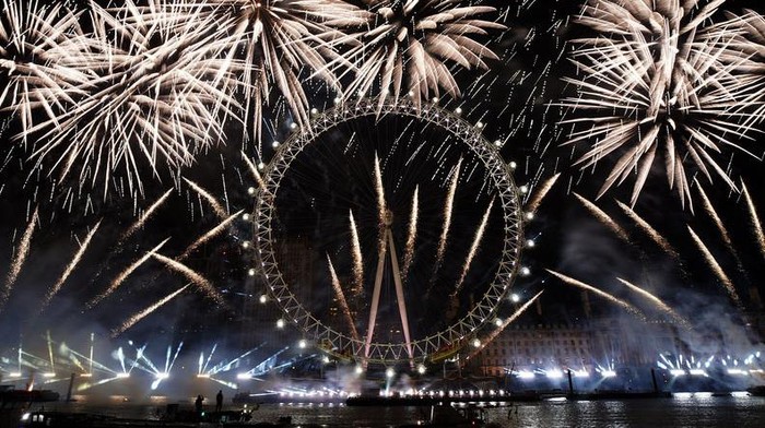 Fireworks light-up the sky over the London Eye in central London to celebrate the New Year on Monday, Jan. 1, 2024.(AP Photo/Alberto Pezzali)
