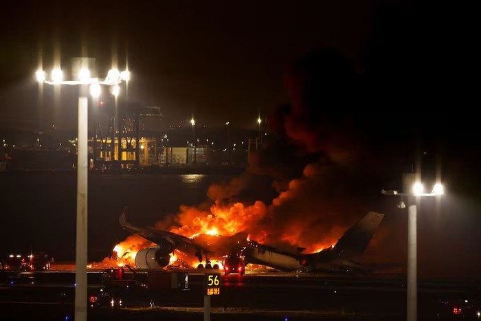 Japan Airlines A350 airplane is on fire at Haneda international airport in Tokyo, Japan January 2, 2024. REUTERS/Issei Kato Acquire Licensing Rights