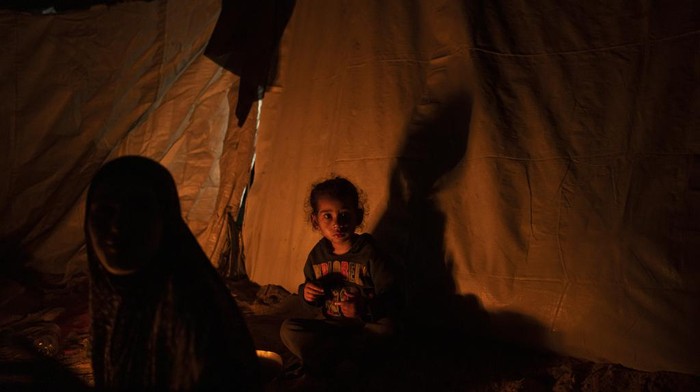 A view of the makeshift tent camp where Palestinians displaced by the Israeli bombardment of the Gaza Strip are staying, in the Muwasi area on Sunday, Dec. 31, 2023. Israel has encouraged Palestinians to move to Muwasi, telling them they will be safe from bombing. (AP Photo/Fatima Shbair)