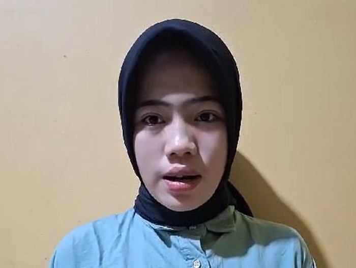 Khoirunnisa yang viral memaksa kucing merokok menyampaikan permohonan maaf. (Foto: tangkapan layar)