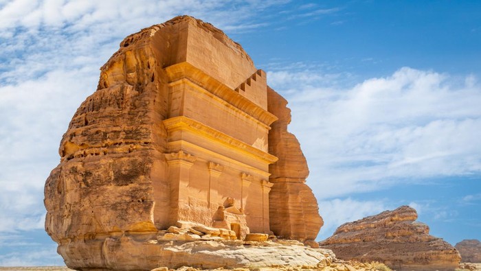 Buses are parked at different places in the desert to take tourists to different places during the day in Al-Ula, Saudi Arabia.