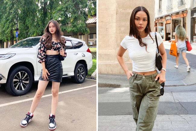 Perbedaan gaya terlihat ketika keduanya memilih padu padan crop top. Laura Moane memilih paduan crop top dan rok pendek. Sementara Alyssa Daguise memakai celana kargo oversize dan kaos putih crop top saat liburan. Foto: Instagram