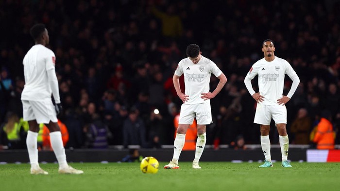 Soccer Football -  FA Cup - Third Round - Arsenal v Liverpool - Emirates Stadium, London, Britain - January 7, 2024 Arsenals Declan Rice and Arsenals William Saliba look dejected after Liverpools Luis Diaz scored their second goal Action Images via Reuters/Matthew Childs