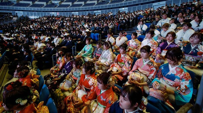 Kimono-clad young women take selfies during their Coming of Age Day celebration ceremony in Yokohama, Japan, January 8, 2024. REUTERS/Androniki Christodoulou