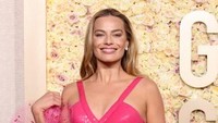 Margot Robbie menjadi perhatian di ajang Golden Globe 2024 karena dominasi nominasi Barbie dan juga penampilan cetarnya. Getty Images via AFP/AMY SUSSMAN