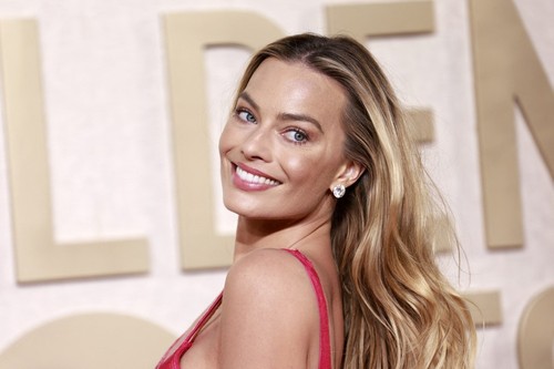 Australian actress Margot Robbie arrives for the 81st annual Golden Globe Awards at The Beverly Hilton hotel in Beverly Hills, California, on January 7, 2024. (Photo by Michael TRAN / AFP)
