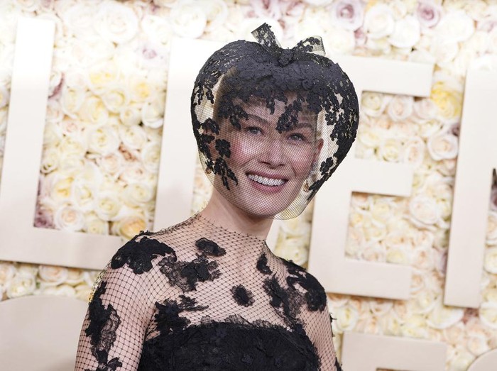 Rosamund Pike arrives at the 81st Golden Globe Awards on Sunday, Jan. 7, 2024, at the Beverly Hilton in Beverly Hills, Calif. (Photo by Jordan Strauss/Invision/AP)