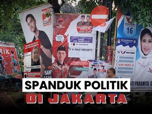 Warna Warni Spanduk Partai-Caleg Penuhi Jalanan Ibu Kota
