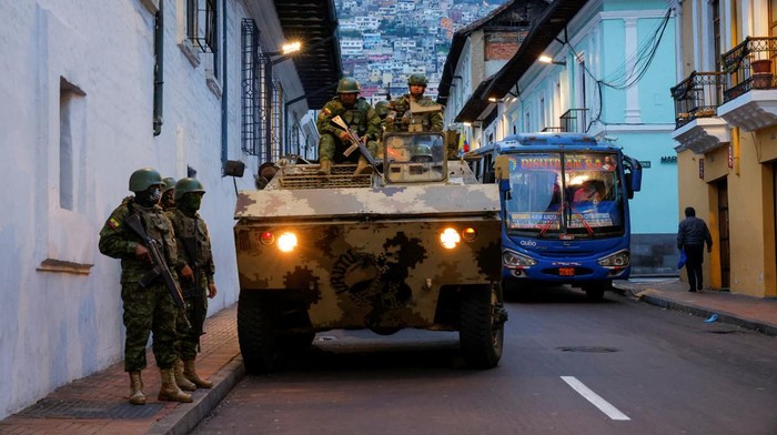 Soldiers in an armoured vehicle patrol the city's historic centre following an outbreak of violence a day after Ecuador's President Daniel Noboa declared a 60-day state of emergency following the disappearance of Adolfo Macias, leader of the Los Choneros criminal gang from the prison where he was serving a 34-year sentence, in Quito, Ecuador, January 9, 2024. REUTERS/Karen Toro