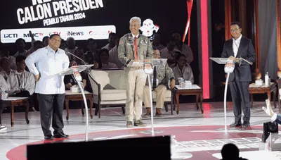 Bingkai Sepekan: Panas Debat Capres ketiga hingga Hari Patah Hati Se-Asia