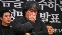 Bong Joon Ho dan anggota Solidaritas Budaya dan Seniman merasa ketidakadilan terhadap Lee Sun Kyun. Di tengah ekspos media yang berlebihan itu, tak ada perlindungan yang diberikan kepada sang aktor. (Foto: AFP/JUNG YEON-JE)