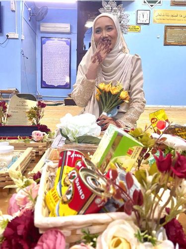 Pernikahan pasangan Siti Masnida Abdul Malek dan Yusri, viral di media sosial.