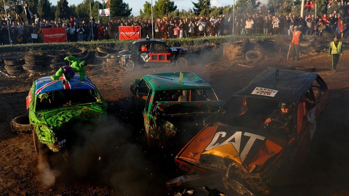 A driver takes part in a car demolition derby organised by the Cars and Motorcycles Sport Association (Malta) to raise funds for the Puttinu Cares children's cancer support group, in Ta' Qali, Malta, January 14, 2024. REUTERS/Darrin Zammit Lupi     TPX IMAGES OF THE DAY