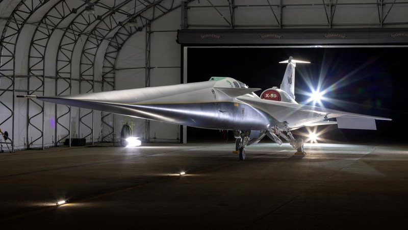 The experimental quiet supersonic aircraft X-59, a collaboration of Lockheed Martin's Skunk Works and NASA, is seen parked on tarmac in Palmdale, California, U.S. December 12, 2023.  Lockheed Martin/Garry Tice/Handout via REUTERS.   THIS IMAGE HAS BEEN SUPPLIED BY A THIRD PARTY