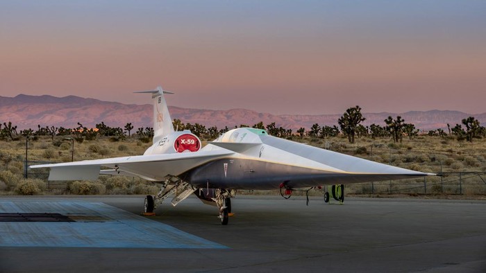 The experimental quiet supersonic aircraft X-59, a collaboration of Lockheed Martins Skunk Works and NASA, is seen parked on tarmac in Palmdale, California, U.S. December 12, 2023.  Lockheed Martin/Garry Tice/Handout via REUTERS.   THIS IMAGE HAS BEEN SUPPLIED BY A THIRD PARTY