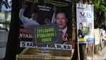 Potret Poster Caleg Dicap Tersangka Penusukan Pohon