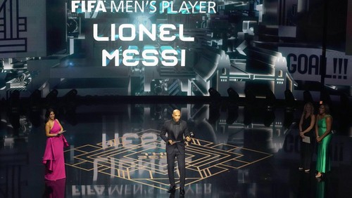 Former France soccer player Thierry Henry accepts on behalf of Argentinas Lionel Messi the Best Mens Player award during the FIFA Football Awards 2023 at the Eventim Apollo in Hammersmith, London, Monday, Jan. 15, 2024. (AP Photo/Kirsty Wigglesworth)