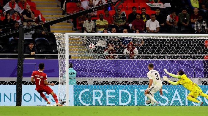 Soccer Football - AFC Asian Cup - Group D - Indonesia v Iraq - Ahmad bin Ali Stadium, Al Rayyan, Qatar - January 15, 2024  Indonesias Marselino Ferdinan scores their first goal REUTERS/Ibraheem Al Omari